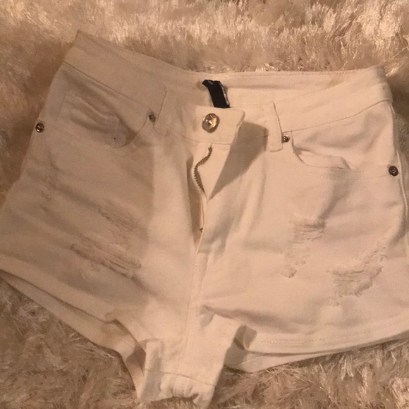 H&M Pants - white high waisted shorts ripped in size 2 H&M Pants - white high waisted shorts ripped in size 2
